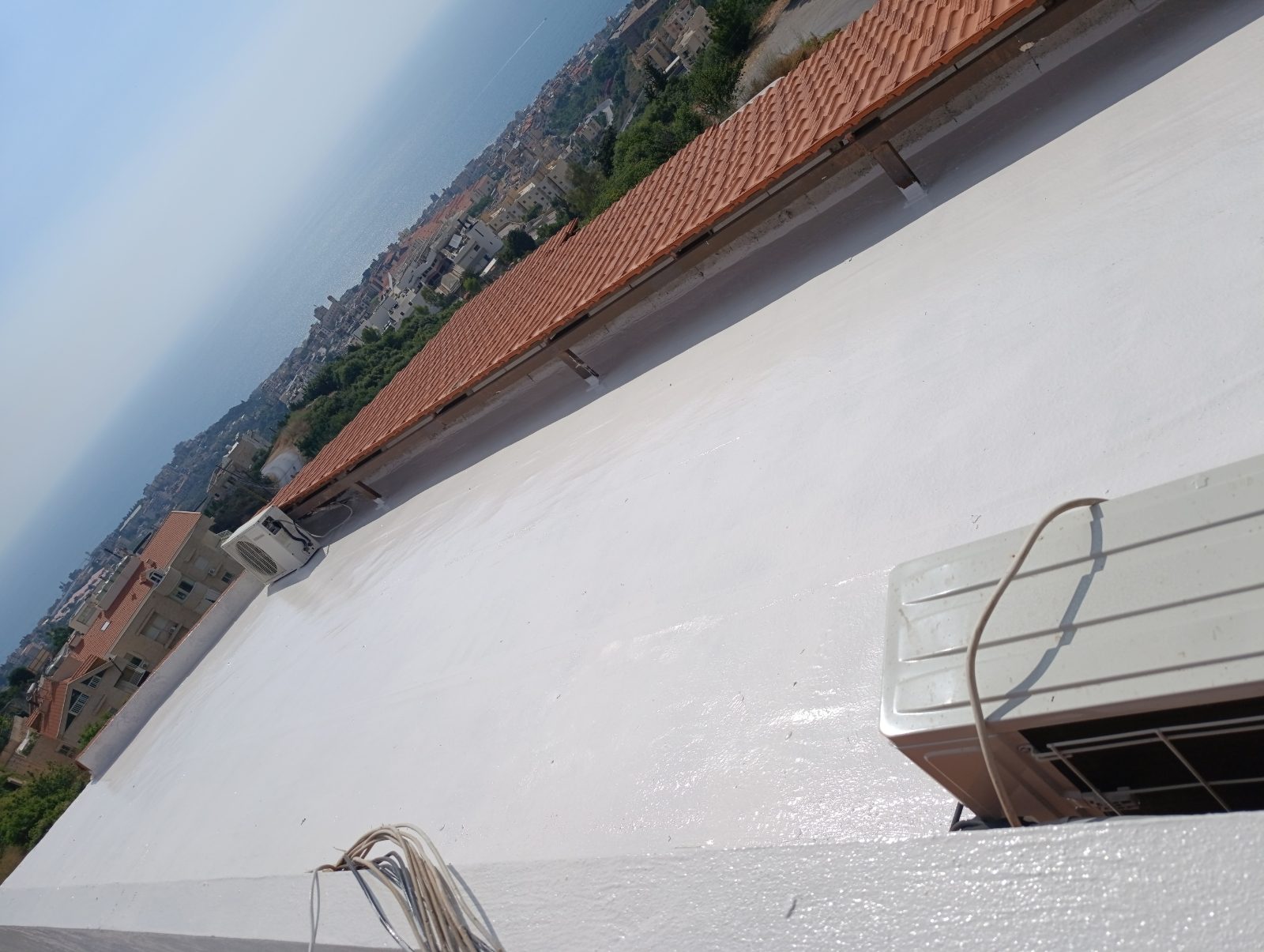 Roof waterproofing and PU insulation, apartment in Halat — CedarCoat Painting (2)